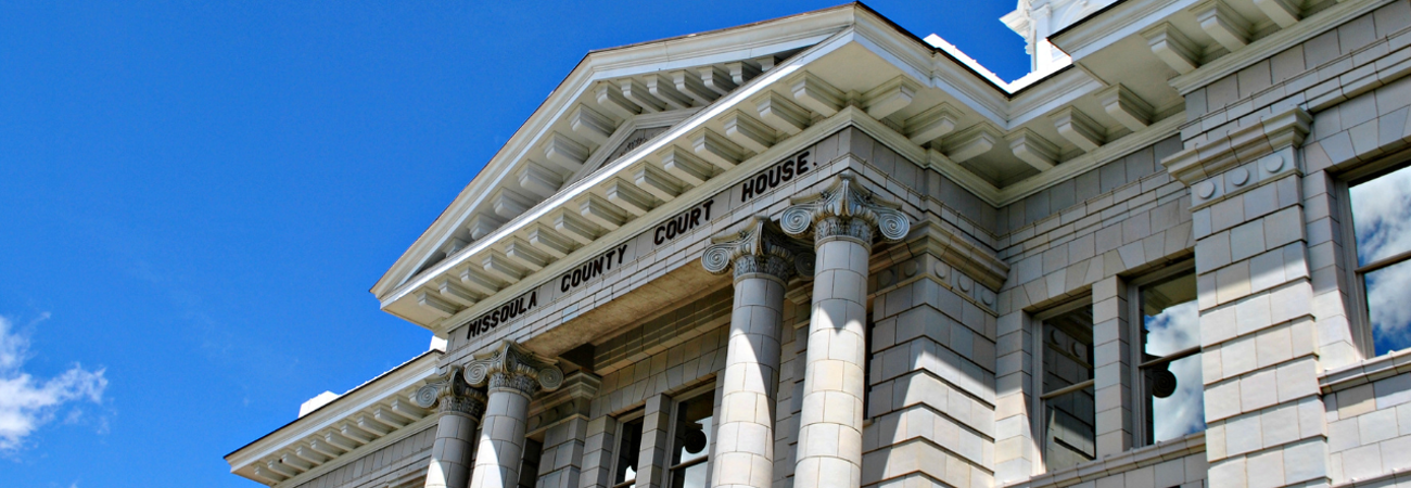Exterior close up of the Missoula County Courthouse on a sunny day