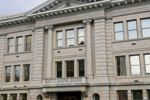 Exterior view of the East side of the Missoula County Courthouse on a cloudy day