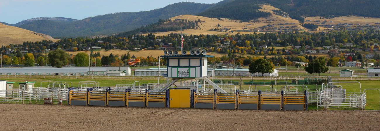 Fairgrounds Arena With Mountains In The Background