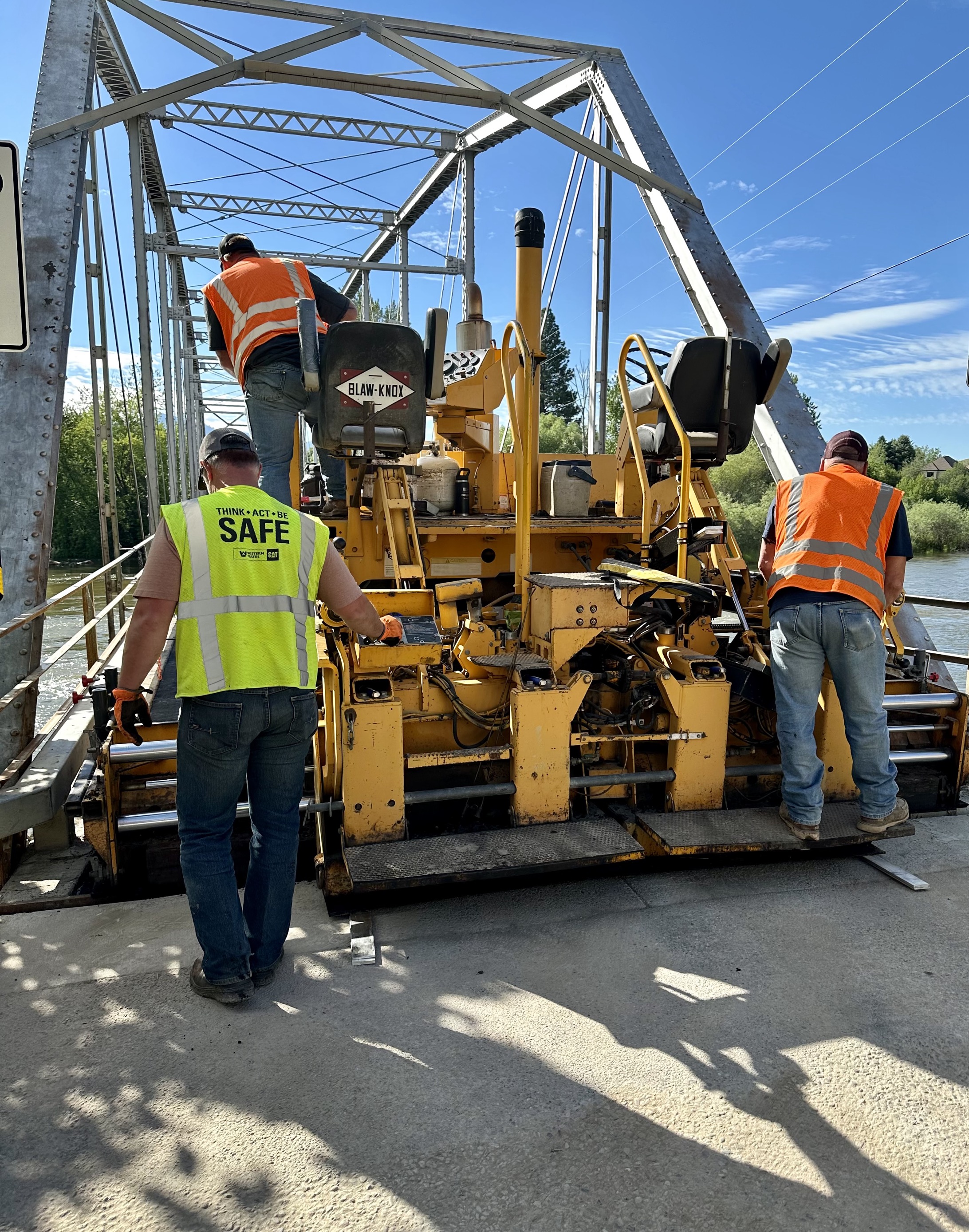 Public Works crews resurfacing the Maclay Bridge in summer 2024